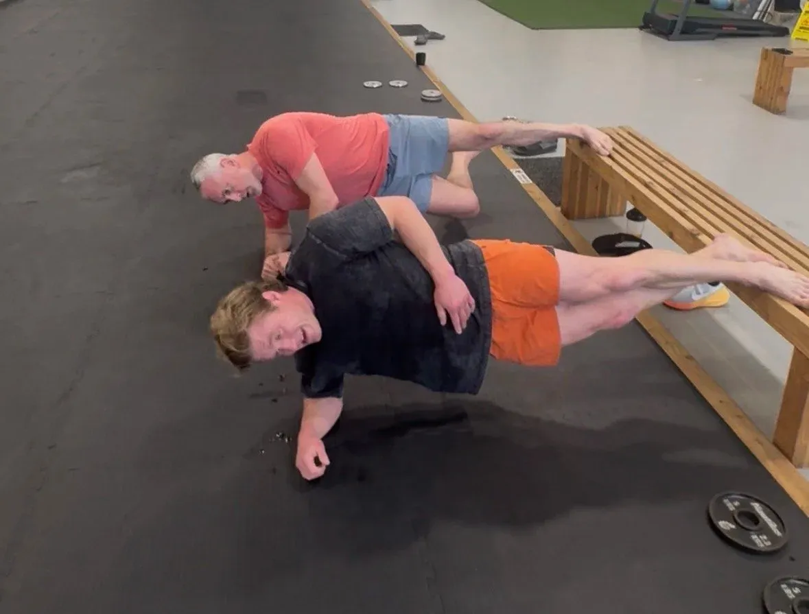 Students conditioning during an evening athletic performance class